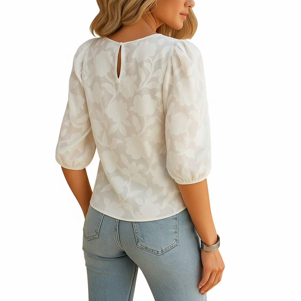 Women’s floral blouse back view with patterned design